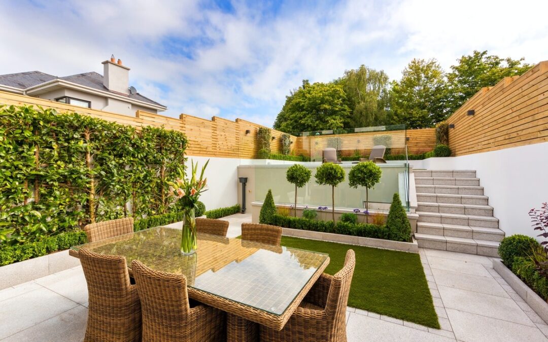 Luxurious modern backyard showcasing Smartway Builders' expert landscaping, retaining walls, and design for home potential