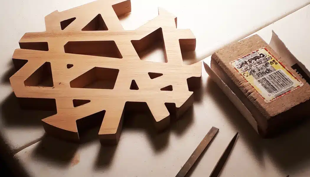 A hot mat made from reclaimed recycled repurposed native timber with a hand sanding block